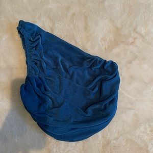 cropped blue one shoulder top